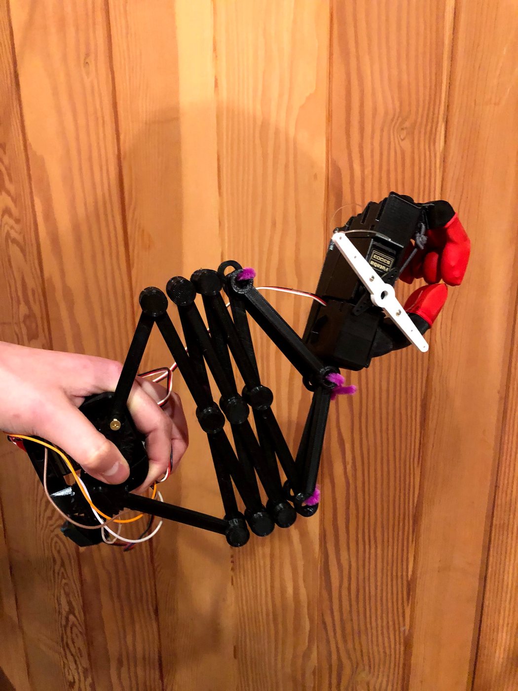 The scissor linkage part-way extended