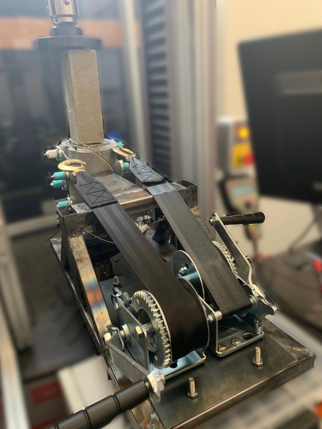 Cable and pulley routing around the surrogate limb